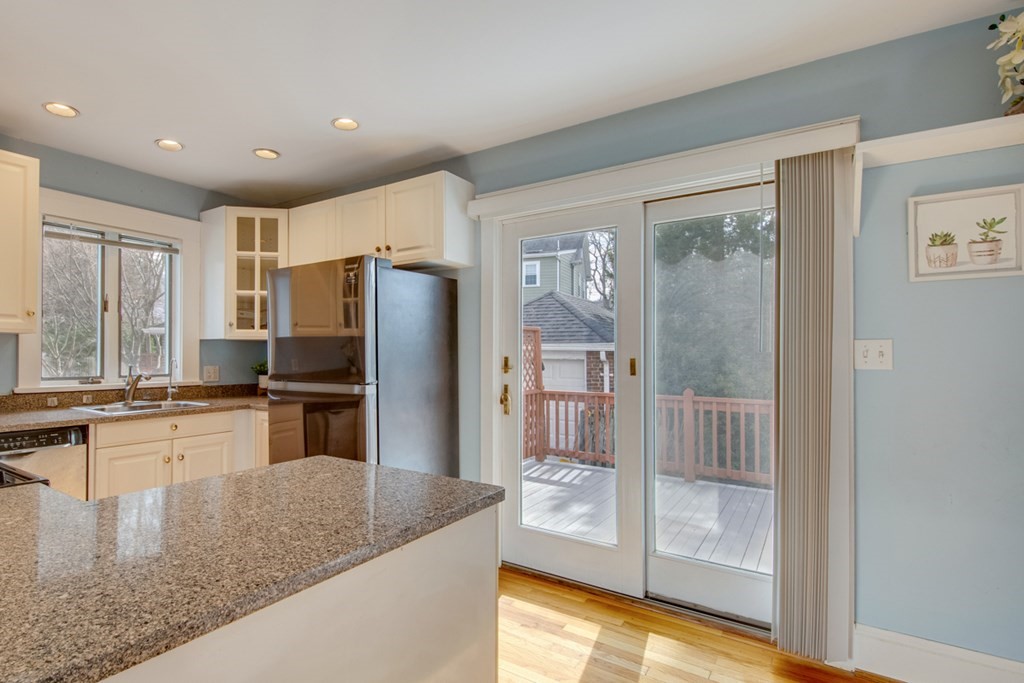11 Angier Circle Newton, MA 02466 - Photo 11 of 21 a kitchen with stainless steel appliances granite countertop a refrigerator and a sink
