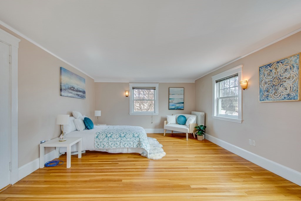 11 Angier Circle Newton, MA 02466 - Photo 12 of 21 a living room with furniture and a wooden floor