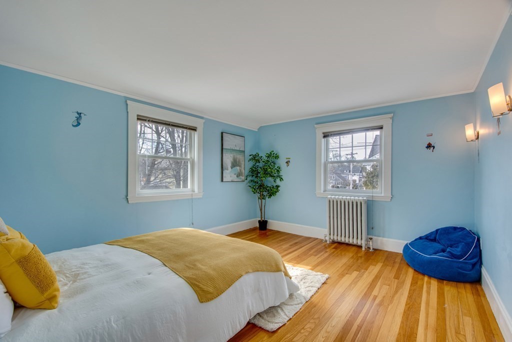 11 Angier Circle Newton, MA 02466 - Photo 15 of 21 a bedroom with a bed and a window