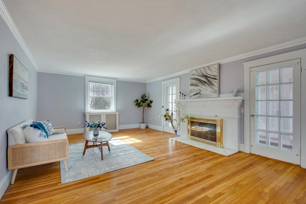 11 Angier Circle Newton, MA 02466 - Photo 4 of 21 a living room with furniture and a fireplace