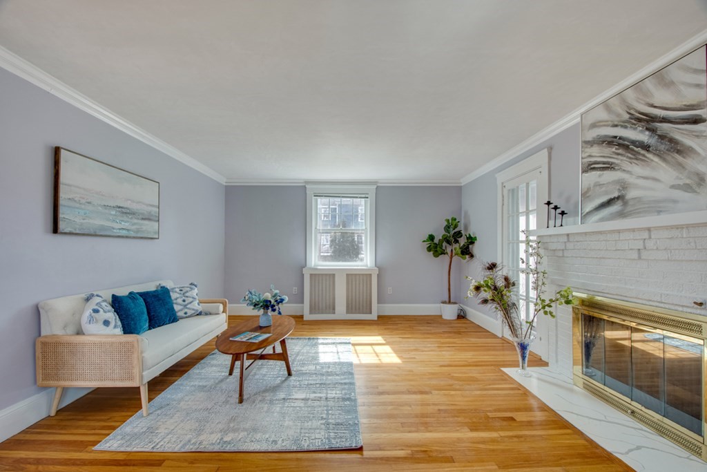 11 Angier Circle Newton, MA 02466 - Photo 5 of 21 a living room with furniture and a fireplace