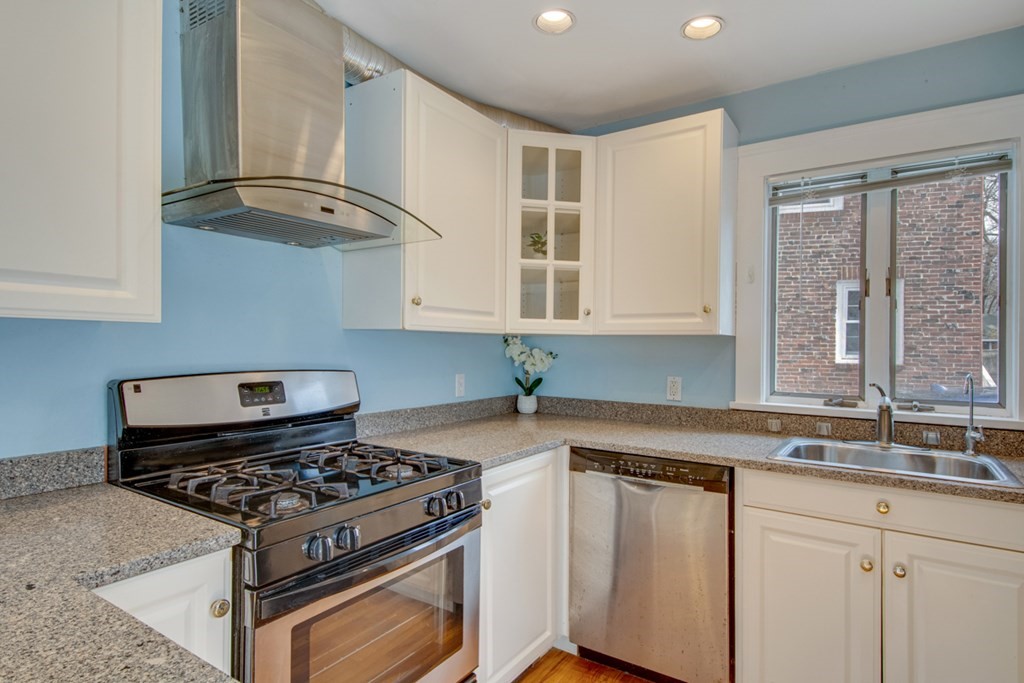 11 Angier Circle Newton, MA 02466 - Photo 10 of 21 a kitchen with cabinets appliances and a sink
