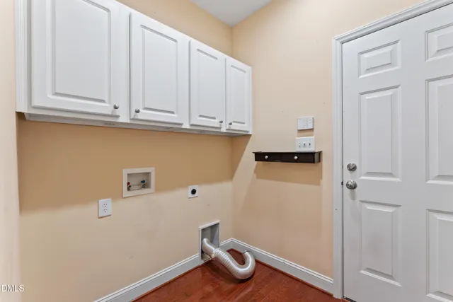 a view of small space with wooden floor