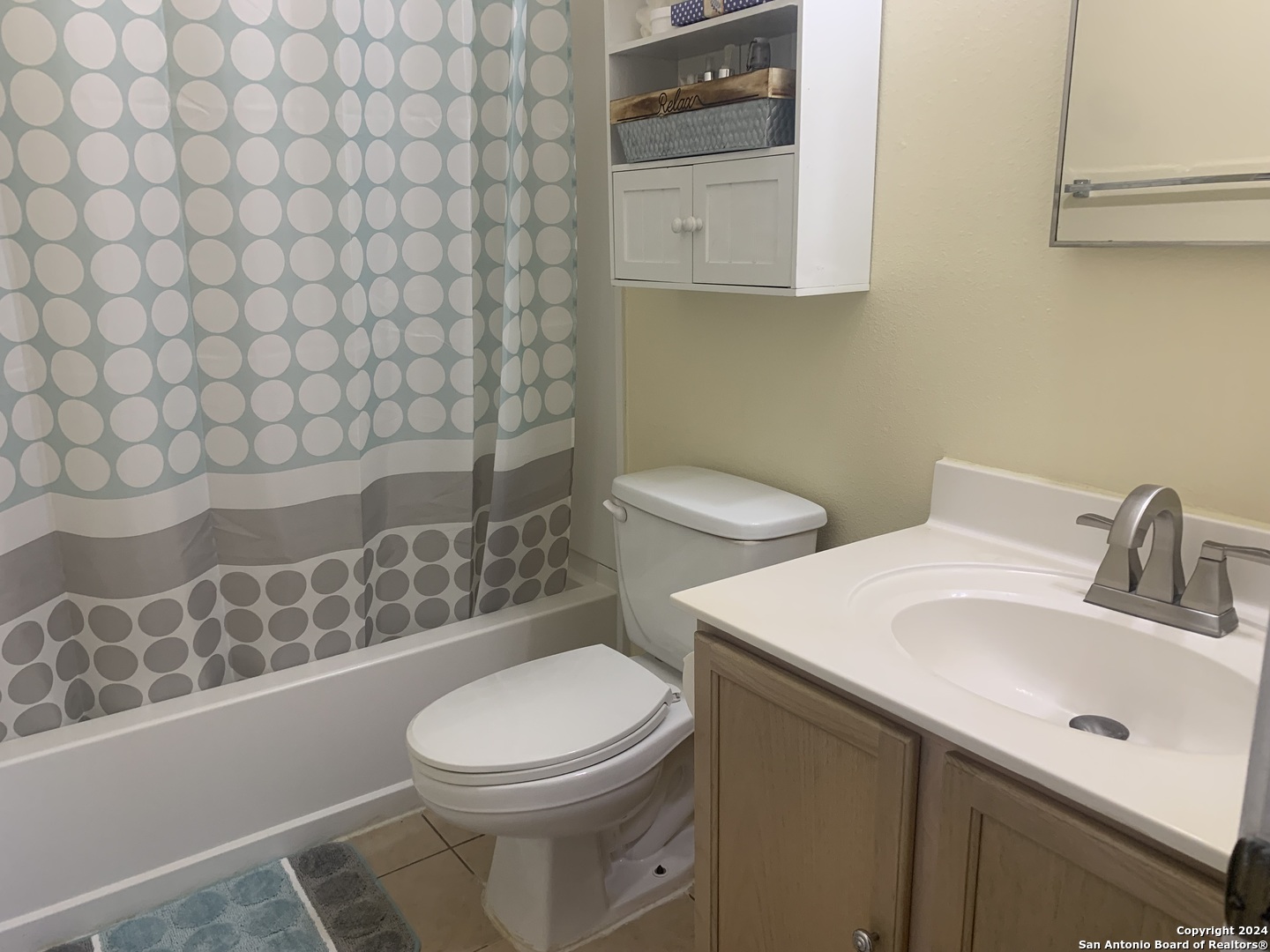 8311 Tavern Point San Antonio, TX 78254 - Photo 14 of 21 a white toilet sitting next to a bathroom sink