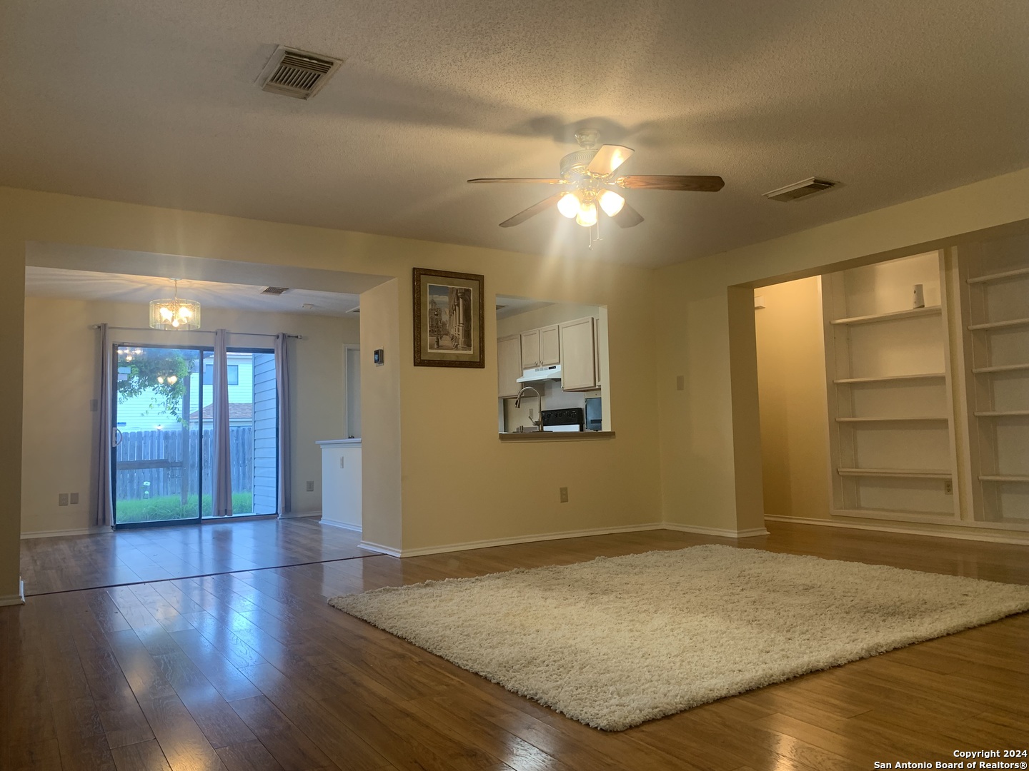 8311 Tavern Point San Antonio, TX 78254 - Photo 3 of 21 an empty room with a empty space and windows