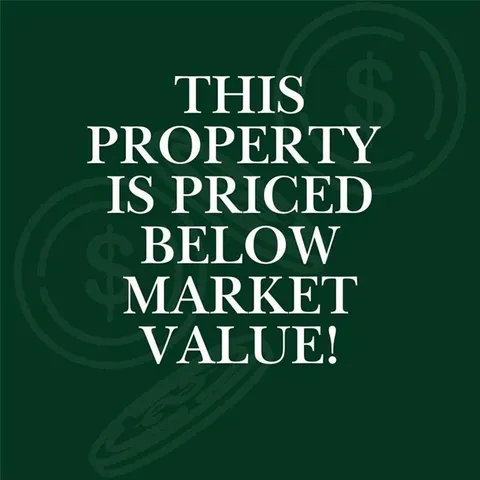 a living room with furniture a fireplace and a floor to ceiling window