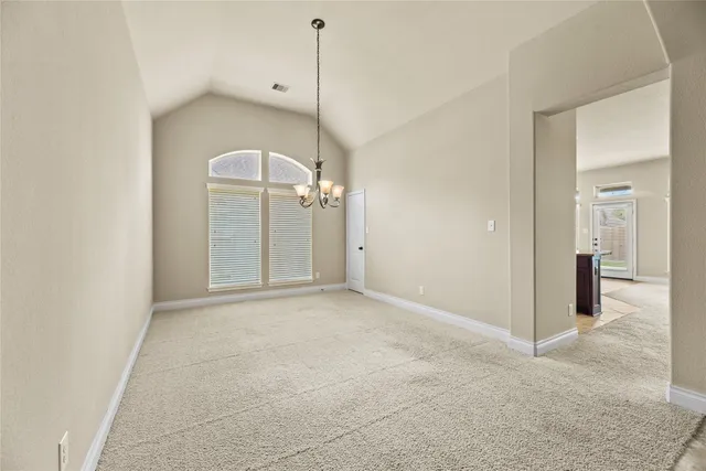 a view of a room with an empty space