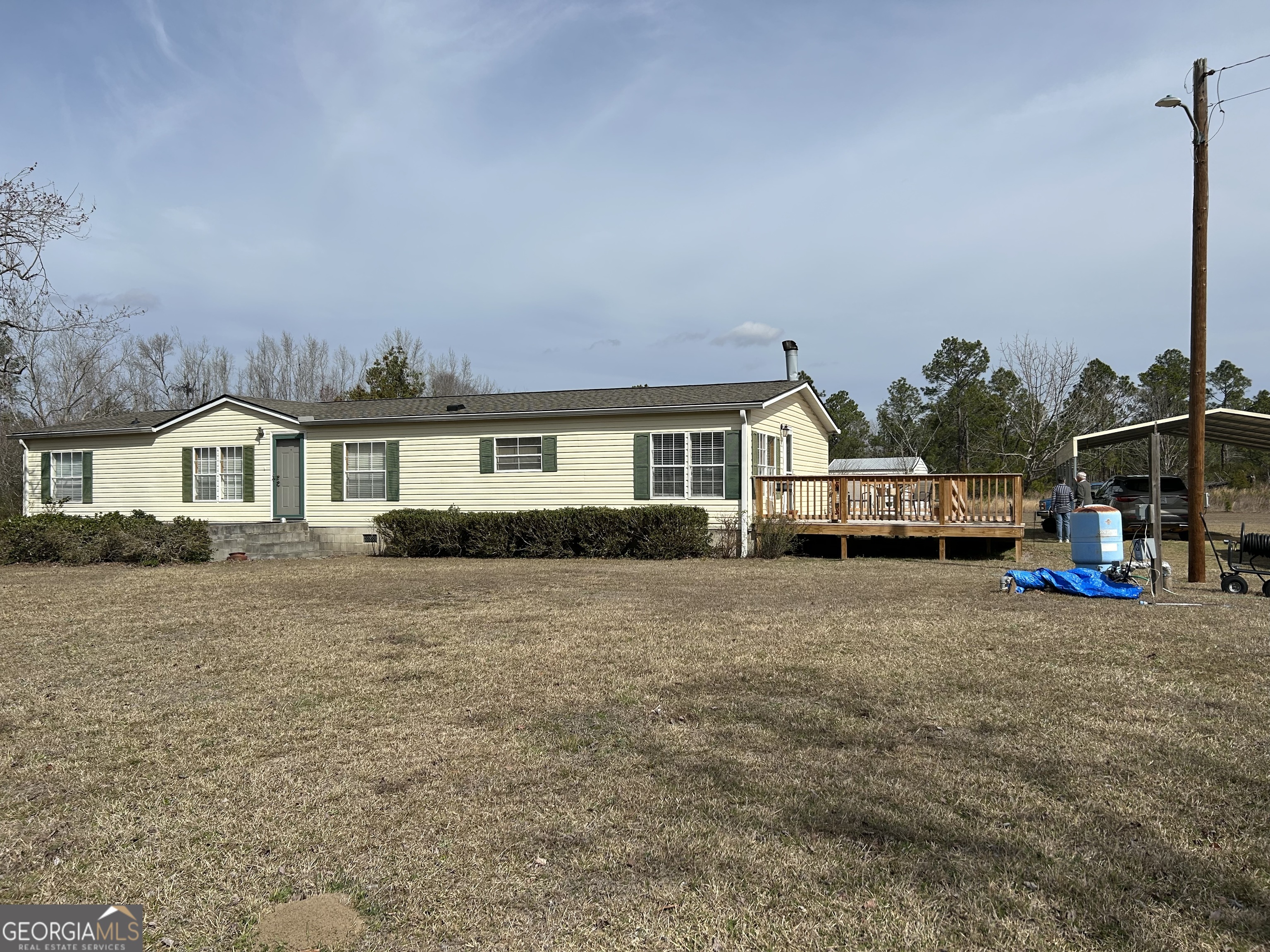 451 Tom McDonald Road Vidalia, GA 30474 - Photo 1 of 1 a house view with a garden space