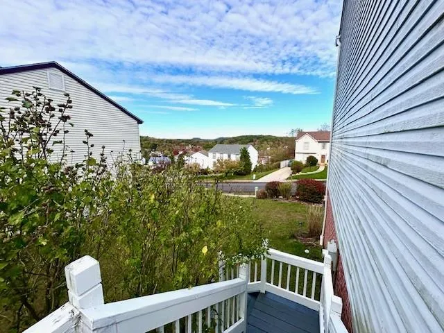 a view of a balcony with an outdoor space