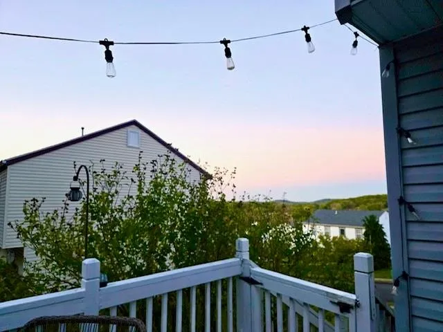 a view of a balcony with city view