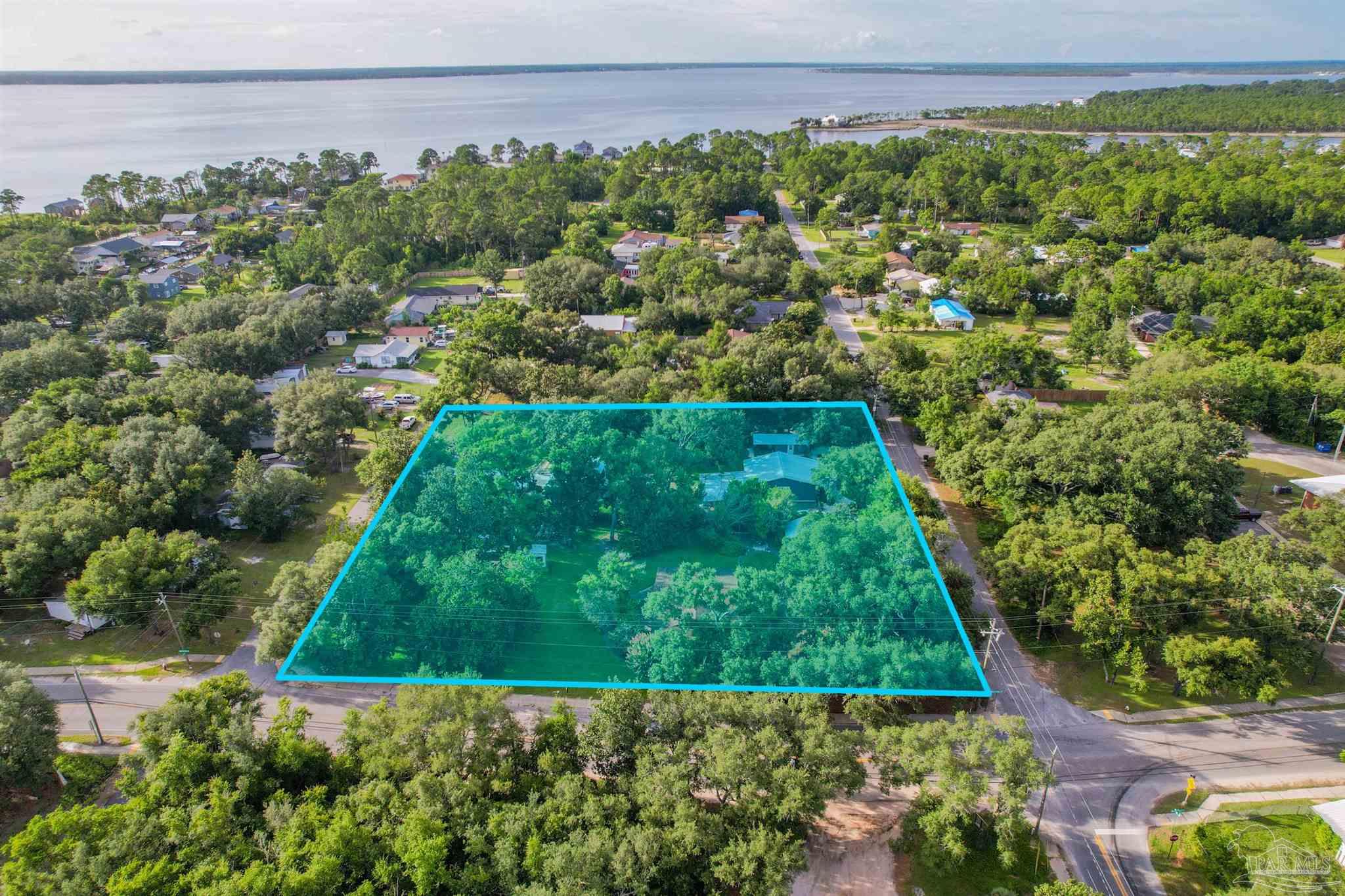 5661 Galvez Road Pensacola, FL 32507 - Photo 27 of 60 a view of a yard with plants