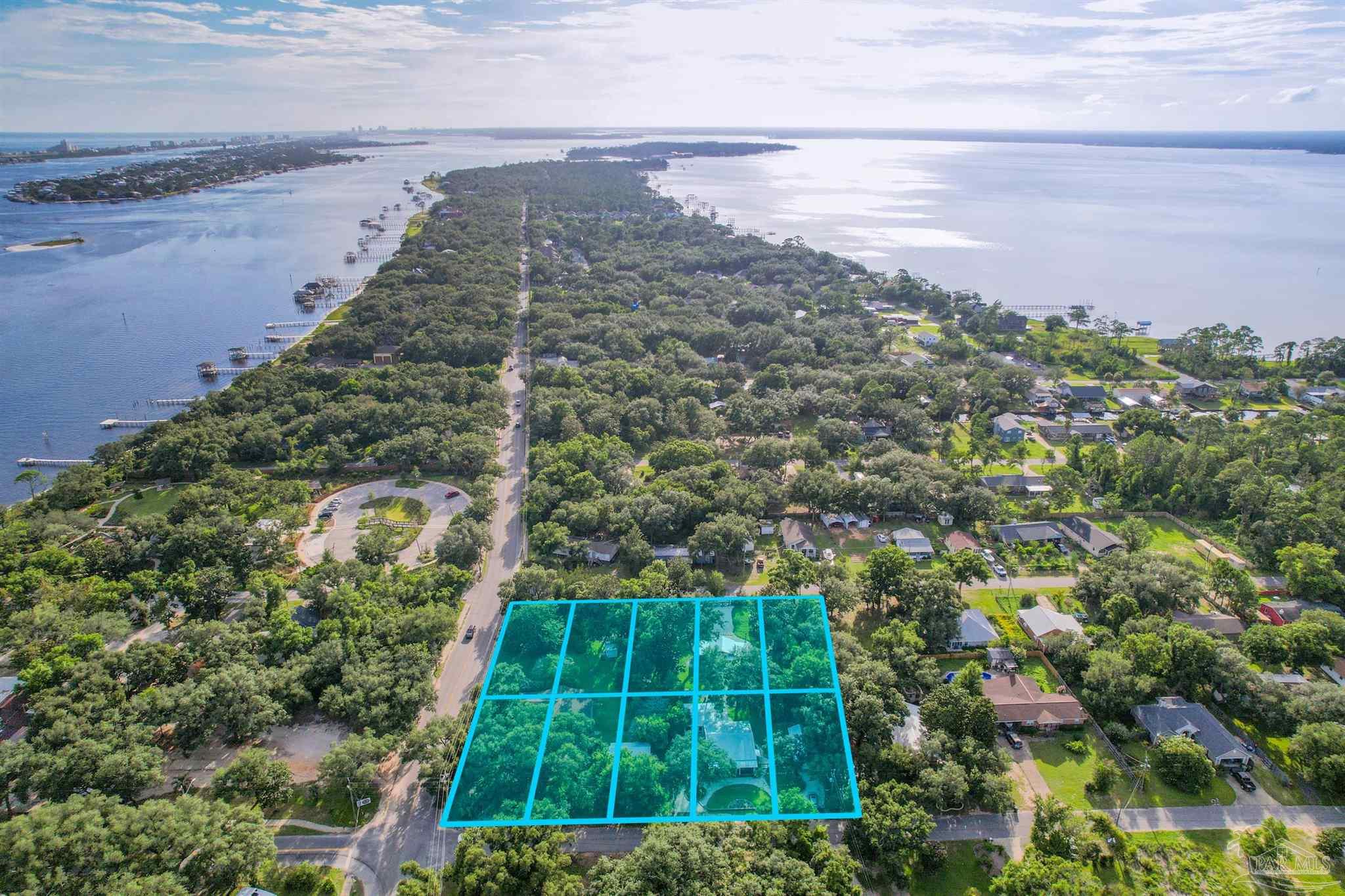 5661 Galvez Road Pensacola, FL 32507 - Photo 30 of 60 a view of a backyard of the house