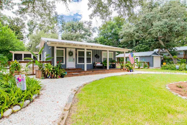 a outdoor living space with furniture and garden view