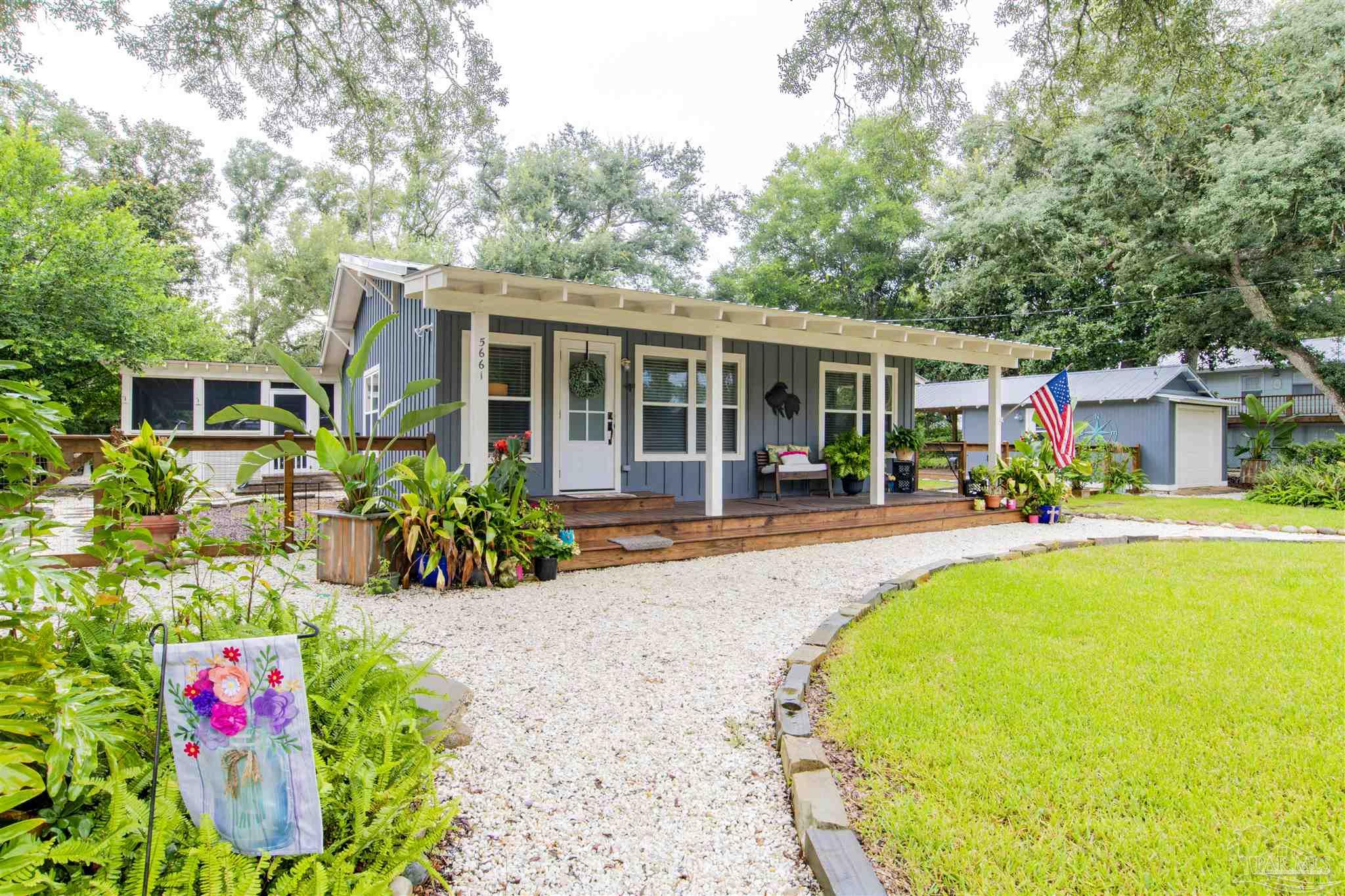 5661 Galvez Road Pensacola, FL 32507 - Photo 35 of 60 a view of a house with swimming pool
