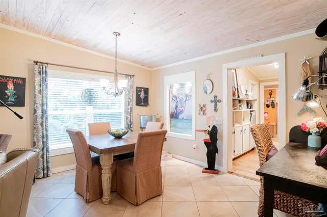 a kitchen with stainless steel appliances a stove a sink and a refrigerator