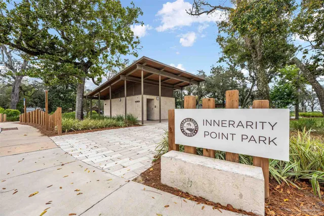 a view of a park with swings and slides