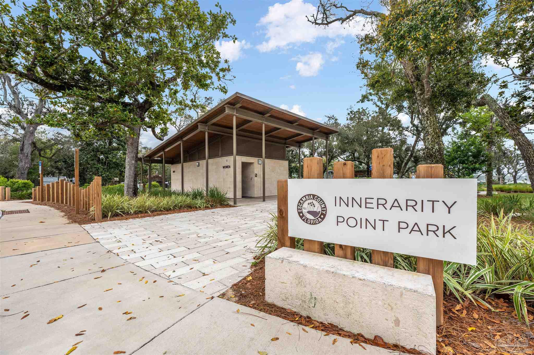 5661 Galvez Road Pensacola, FL 32507 - Photo 5 of 60 a view of a sign board