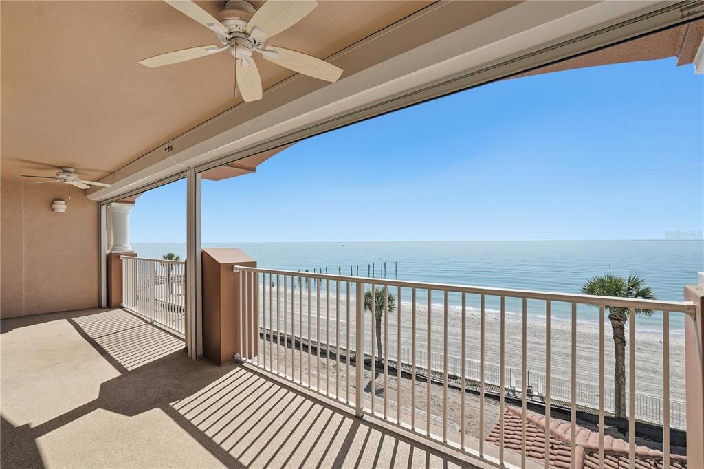 16326 Gulf Boulevard, Unit 307 Redington Beach, FL 33708 - Photo 33 of 43 a view of a balcony with wooden floor