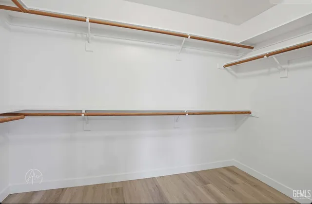 a view of a room with racks on the wall