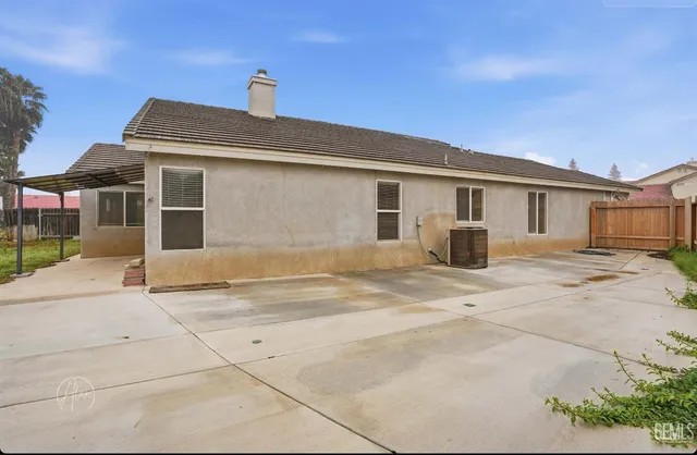 a front view of a house with a garage