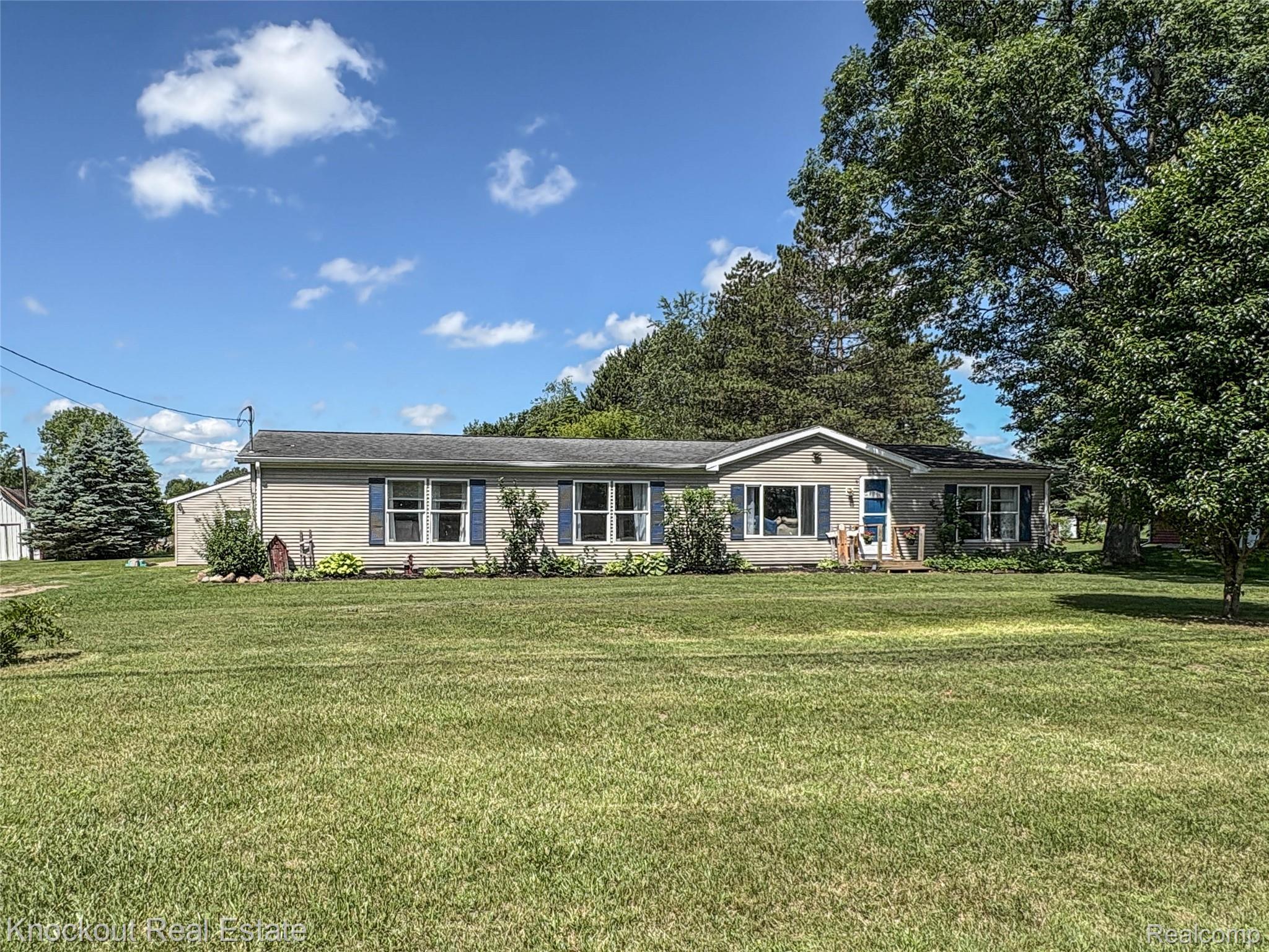 7760 Bell Road Birch Run, MI 48415 - Photo 67 of 68 Single-story residence featuring light-colored siding and a dark roofline