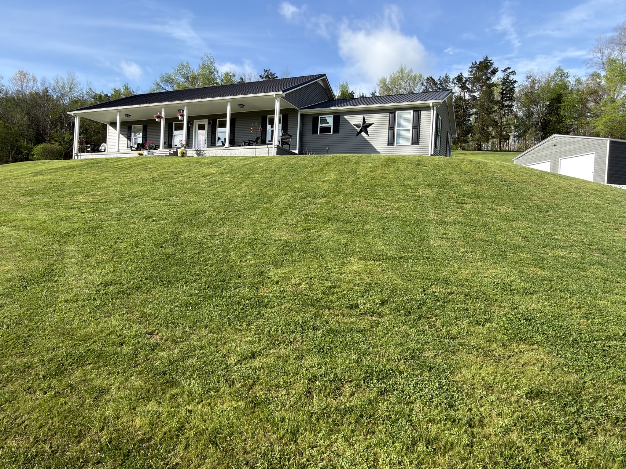 1447 West Beaverdam Road Centerville, TN 37033 - Photo 62 of 62 a view of a house with a yard