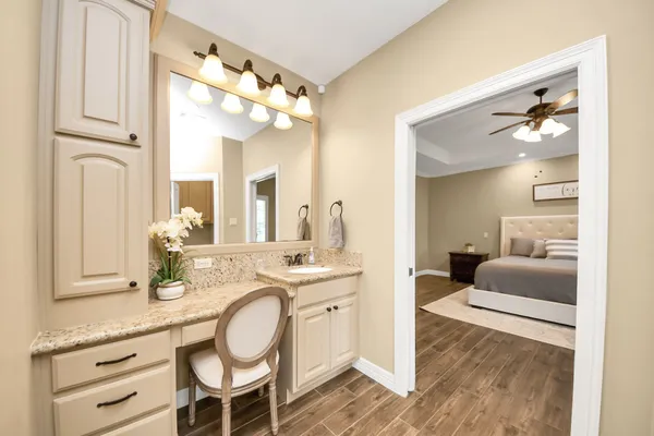 a utility room with sink dryer and washer