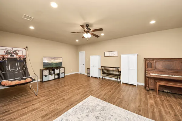 a view of outdoor space with deck and yard