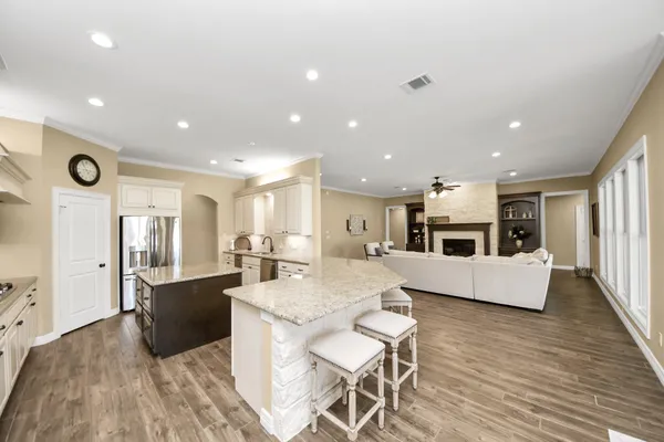a spacious bathroom with a double vanity sink and a bathtub