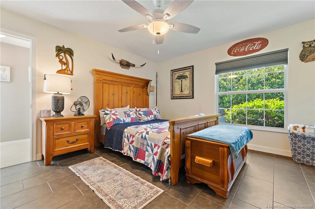 8577 Southwest Sea Captain Drive Stuart, FL 34997 - Photo 51 of 68 En Suite Bedroom