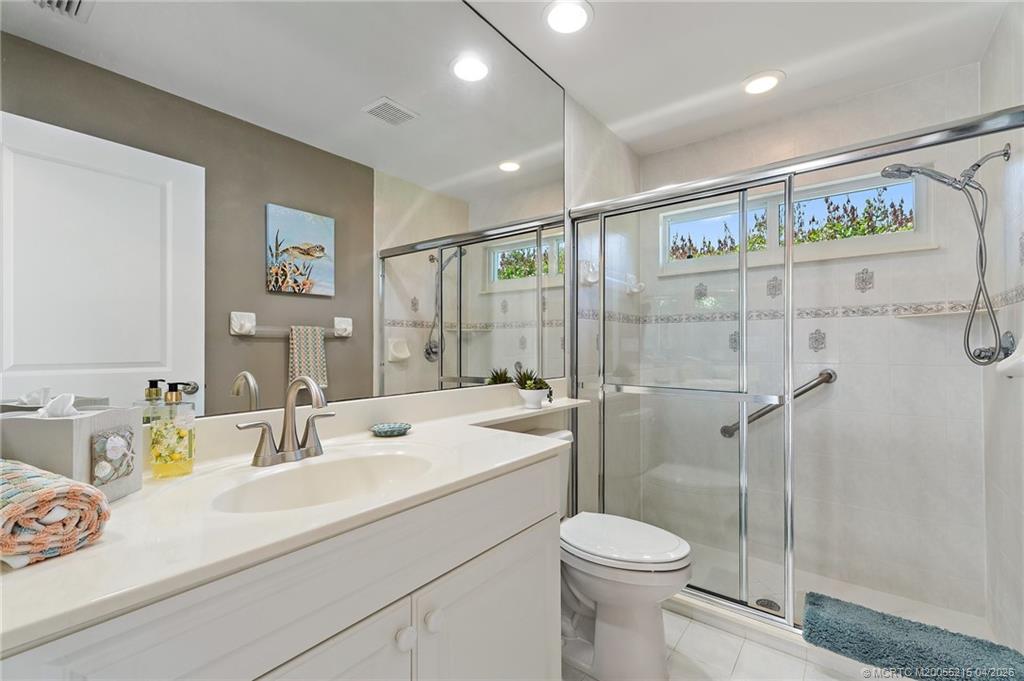 8577 Southwest Sea Captain Drive Stuart, FL 34997 - Photo 52 of 68 Cabana Bathroom connected to third bedroom