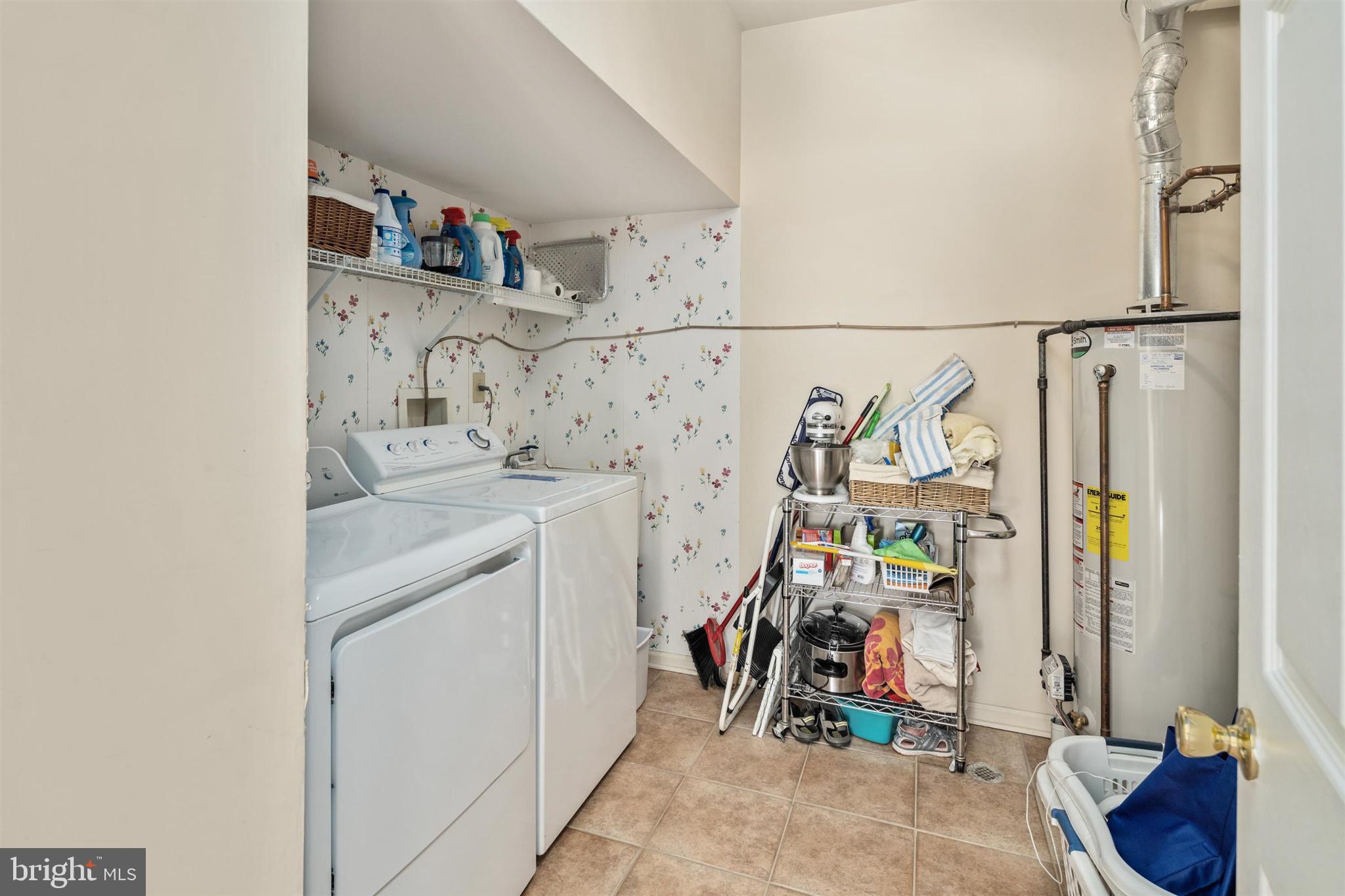 16 Winterberry Terrace Hamilton, NJ 08690 - Photo 12 of 26 a view of storage and utility room with washer and dryer