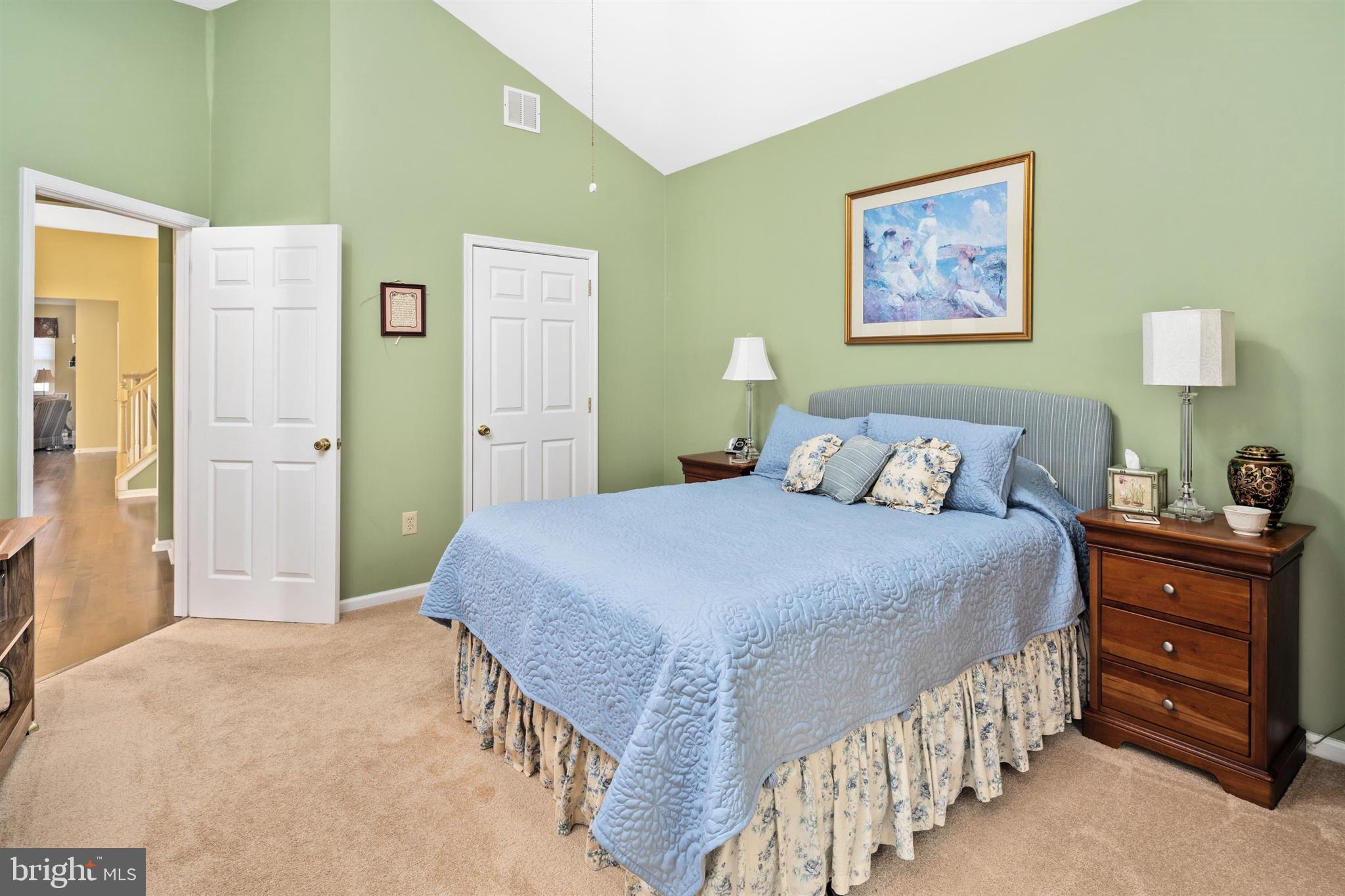 16 Winterberry Terrace Hamilton, NJ 08690 - Photo 15 of 26 a bedroom with a bed and a painting on the wall