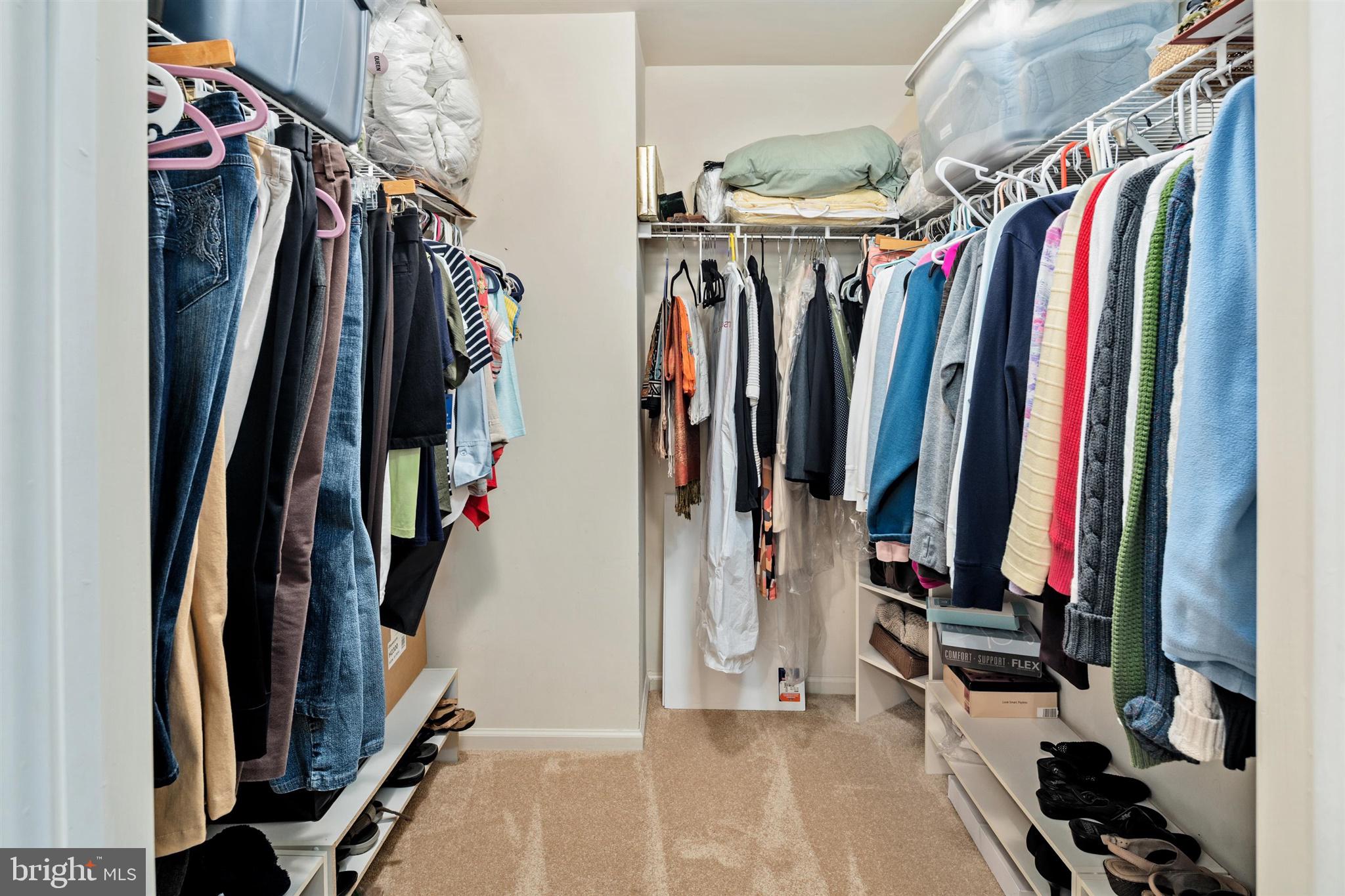 16 Winterberry Terrace Hamilton, NJ 08690 - Photo 16 of 26 a view of walk in closet with clothes