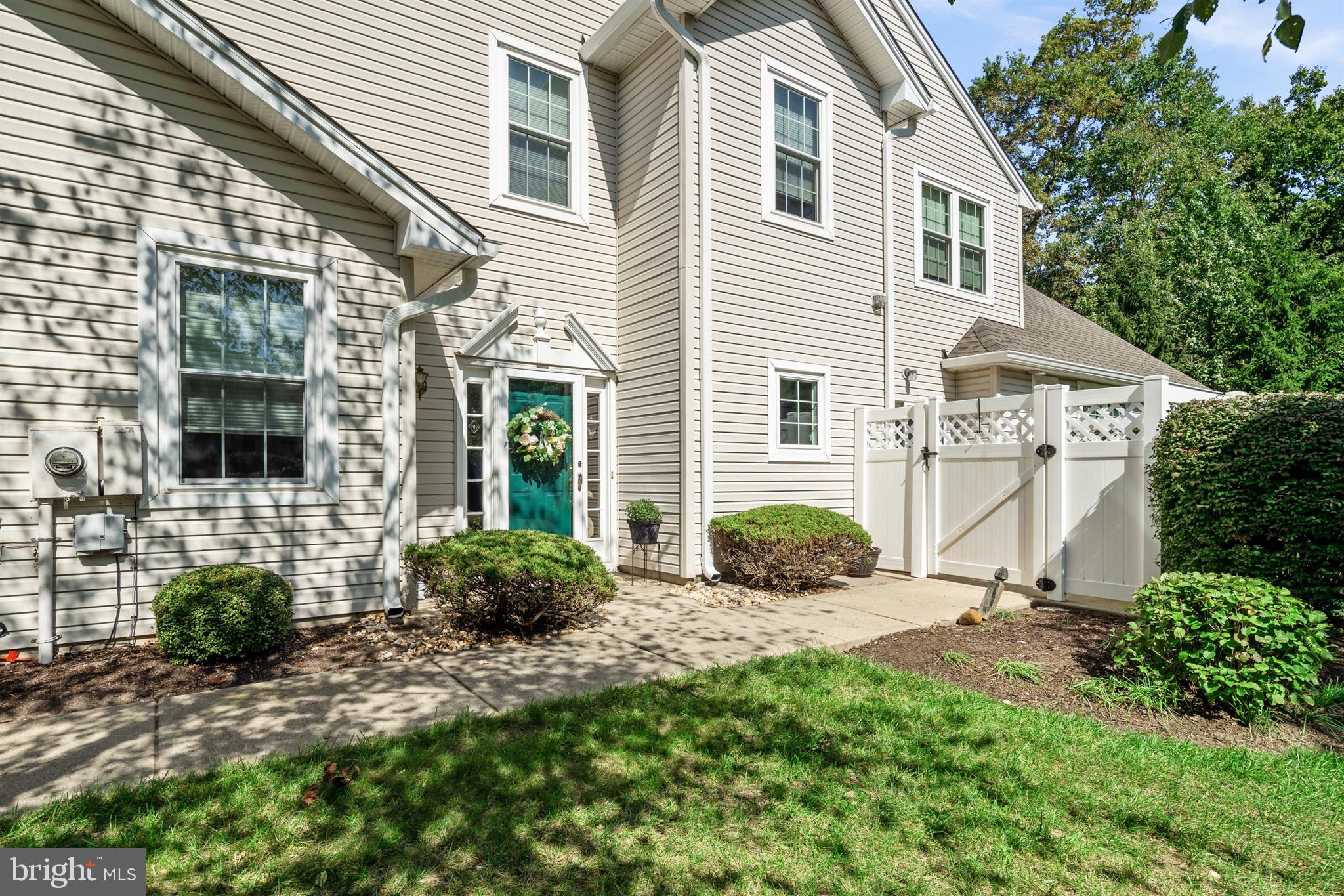 16 Winterberry Terrace Hamilton, NJ 08690 - Photo 3 of 26 a view of a house with backyard and a garden