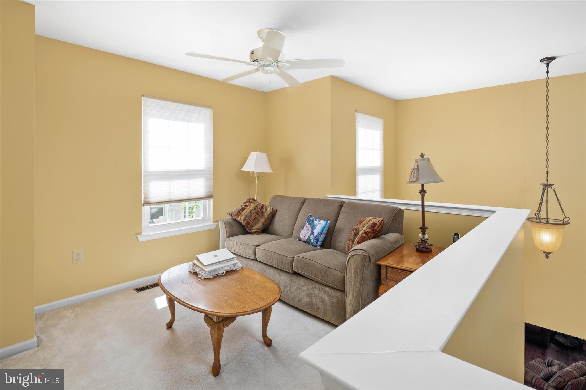 16 Winterberry Terrace Hamilton, NJ 08690 - Photo 23 of 26 a living room with furniture and a large window