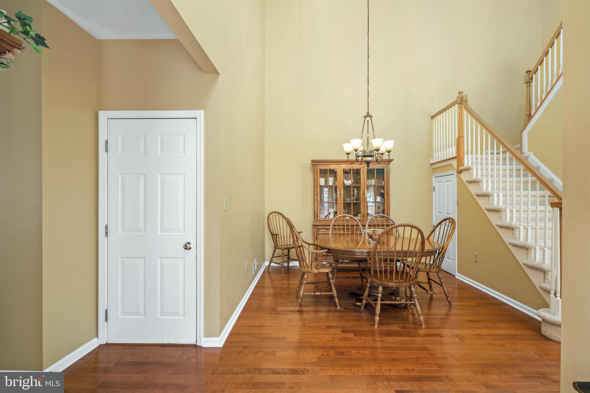 16 Winterberry Terrace Hamilton, NJ 08690 - Photo 4 of 26 a view of a dining room with furniture and wooden floor