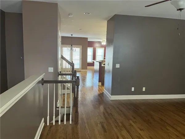a view of entryway with wooden floor
