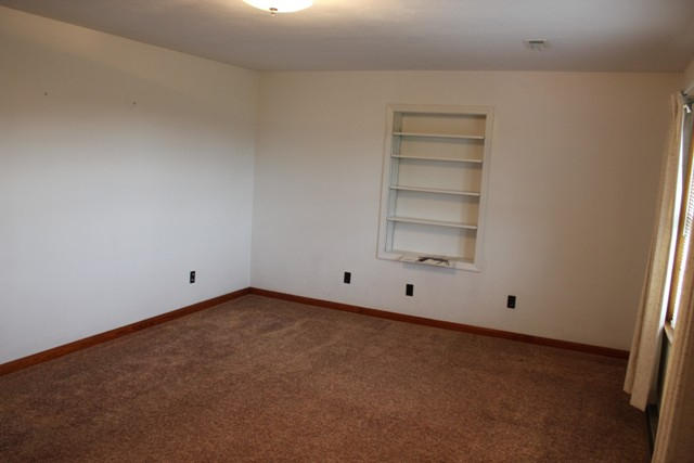 4501 Retreat Road Boones Mill, VA 24065 - Photo 18 of 57 an empty room with cabinet