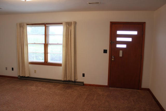 4501 Retreat Road Boones Mill, VA 24065 - Photo 19 of 57 an empty room with windows and closet