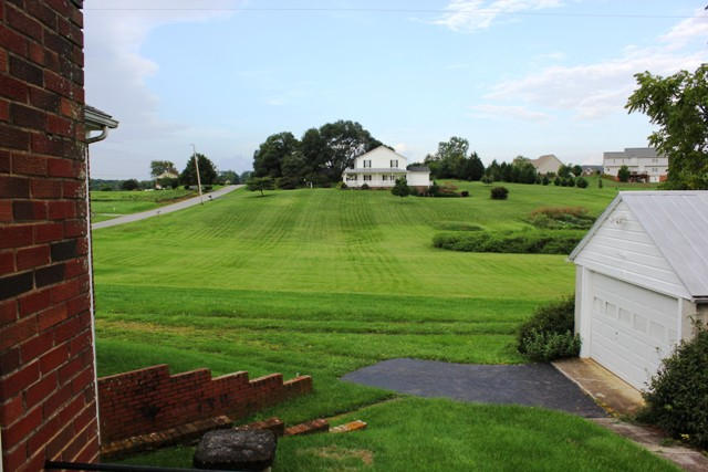 4501 Retreat Road Boones Mill, VA 24065 - Photo 7 of 57 a view of a golf course with a garden
