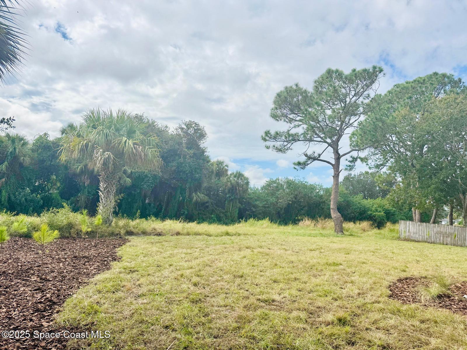 5915 Akers Street Cocoa, FL 32927 - Photo 13 of 33 a view of swimming pool with a yard