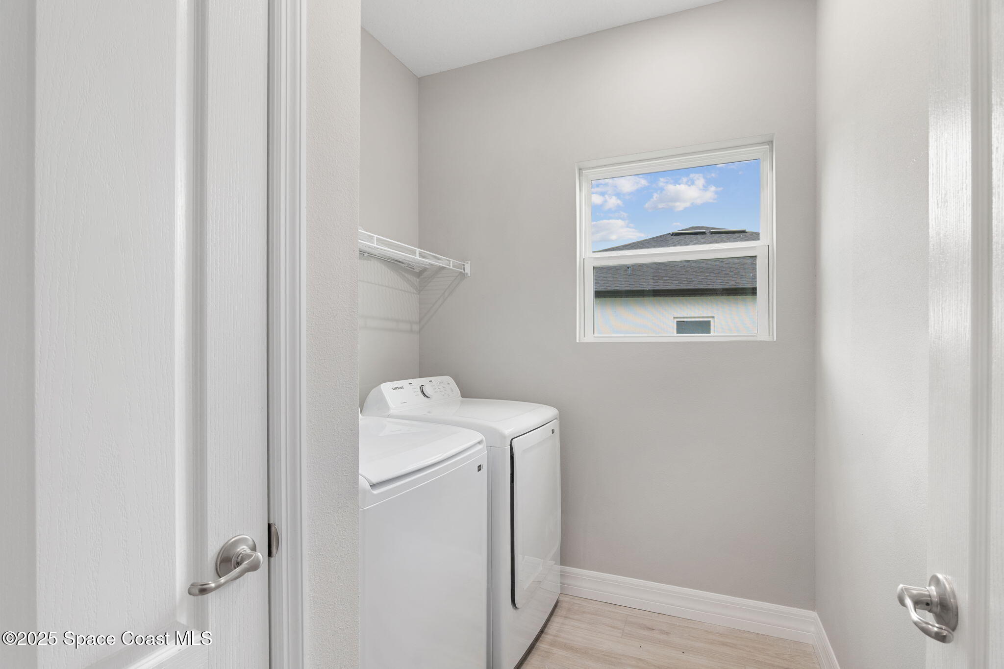 5915 Akers Street Cocoa, FL 32927 - Photo 33 of 33 a utility room with dryer and washer