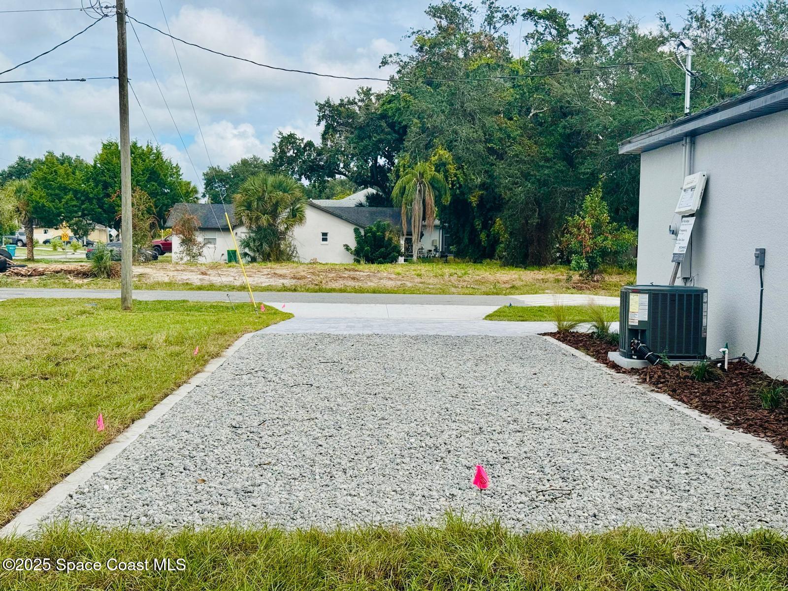 5915 Akers Street Cocoa, FL 32927 - Photo 5 of 33 a view of a house with a swimming pool