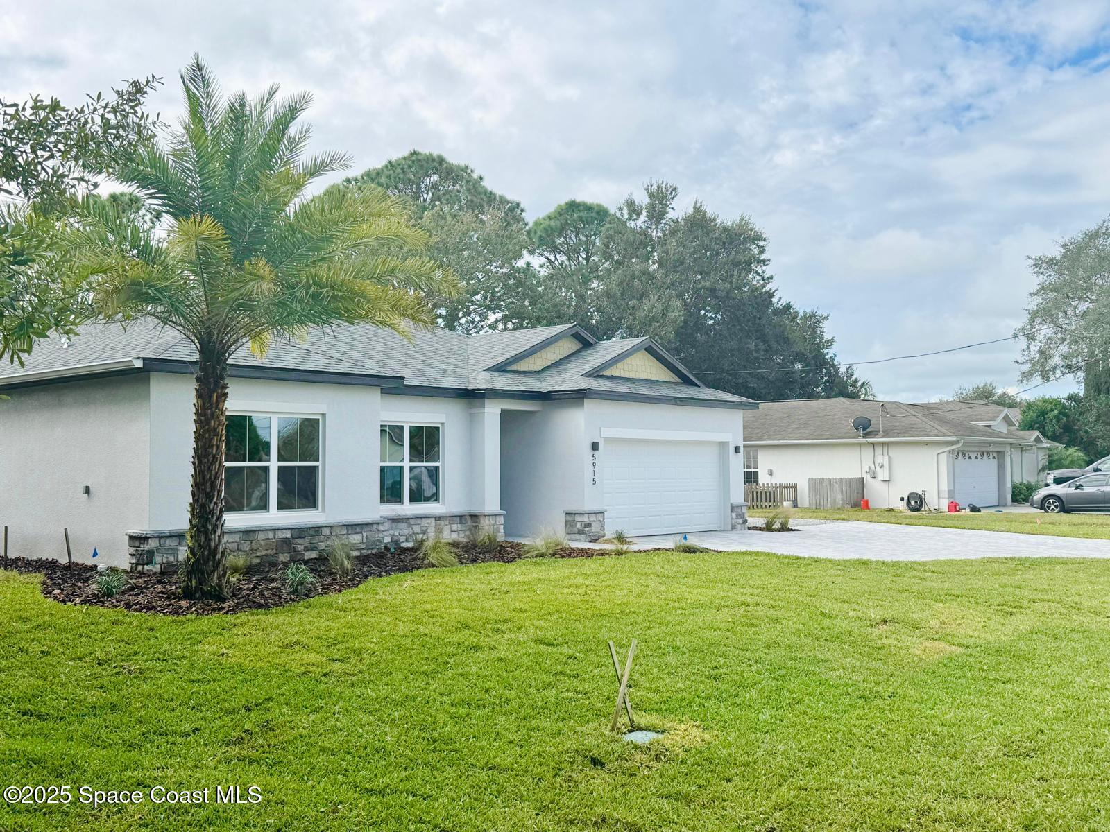 5915 Akers Street Cocoa, FL 32927 - Photo 7 of 33 a house view with a outdoor space