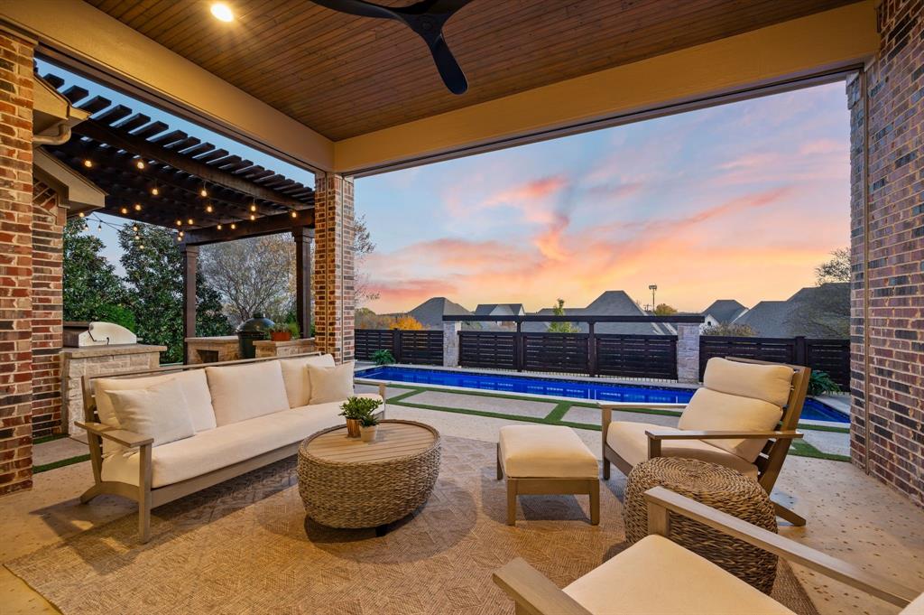 909 Winding Ridge Trail Southlake, TX 76092 - Photo 28 of 36 a roof deck with a couch and chairs