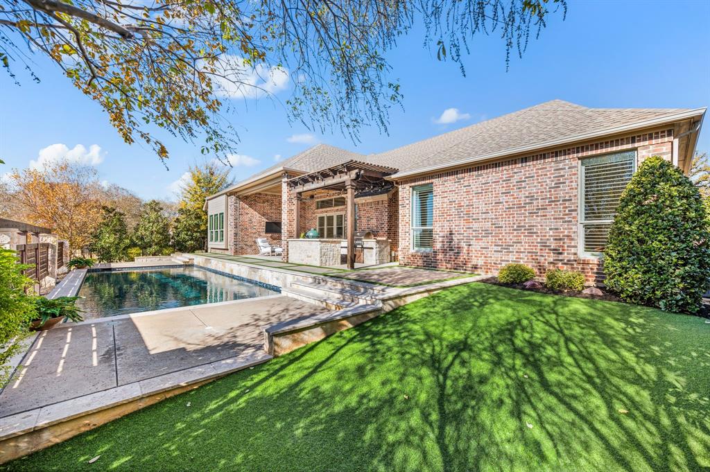 909 Winding Ridge Trail Southlake, TX 76092 - Photo 31 of 36 a front view of house with yard and green space