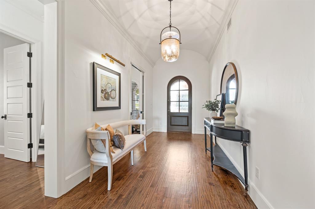 909 Winding Ridge Trail Southlake, TX 76092 - Photo 4 of 36 a view of a livingroom with furniture and wooden floor