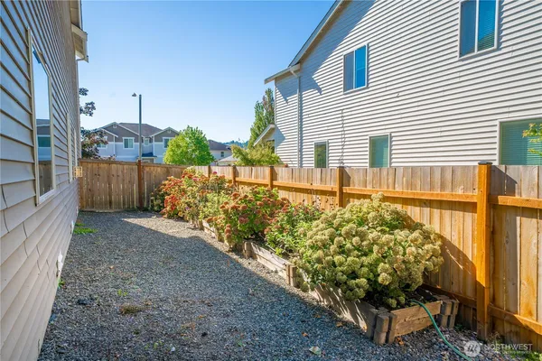 a view of porch with wooden fence