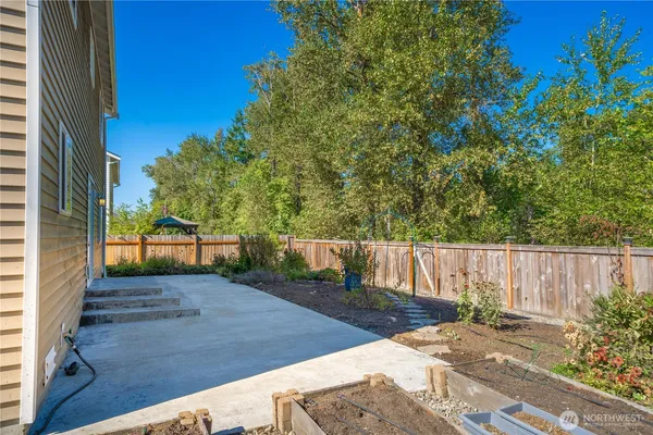 a house view with a backyard space